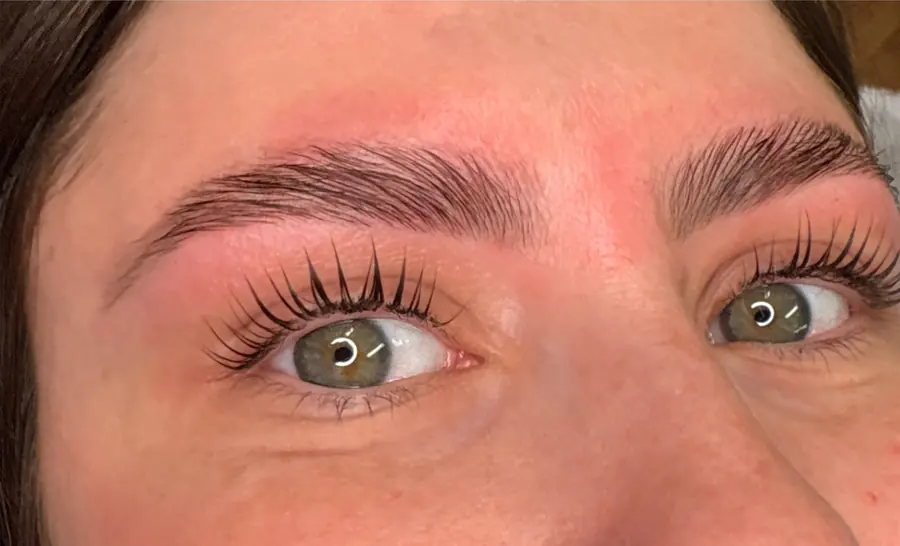 The same client after a Korean lash lift with brow lamination